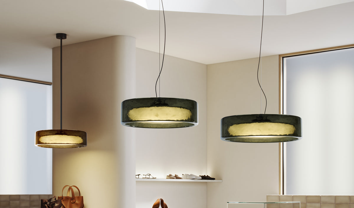 Ringo Pendant Light by Marset, showing ringo pendant lights in live shot.