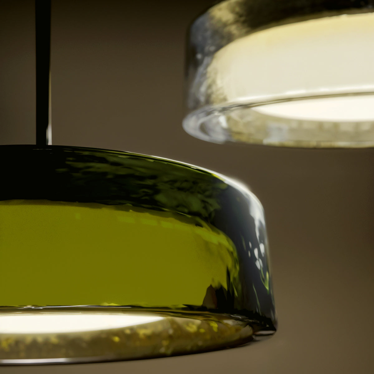 Ringo Pendant Light by Marset, showing closeup view of ringo pendant lights in live shot.