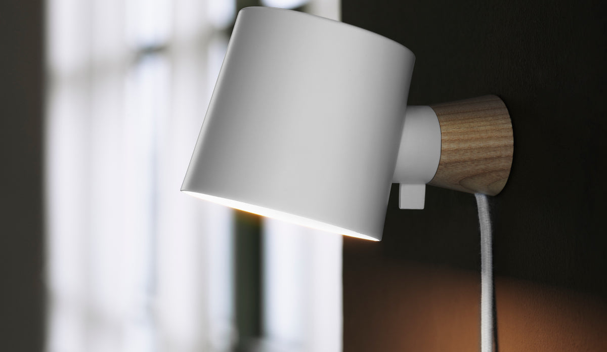 Rise Wall Lamp by Normann Copenhagen, showing rise wall lamp in live shot.