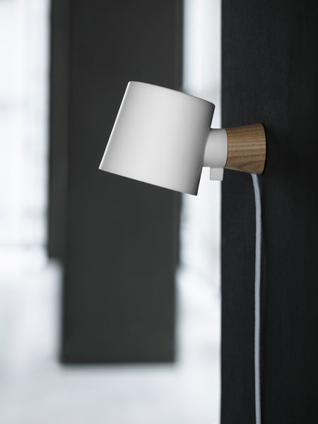 Rise Wall Lamp by Normann Copenhagen, showing rise wall lamp in live shot.