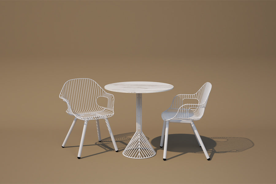 Rita Arm Chair by Bend, showing rita arm chairs with table in live shot.