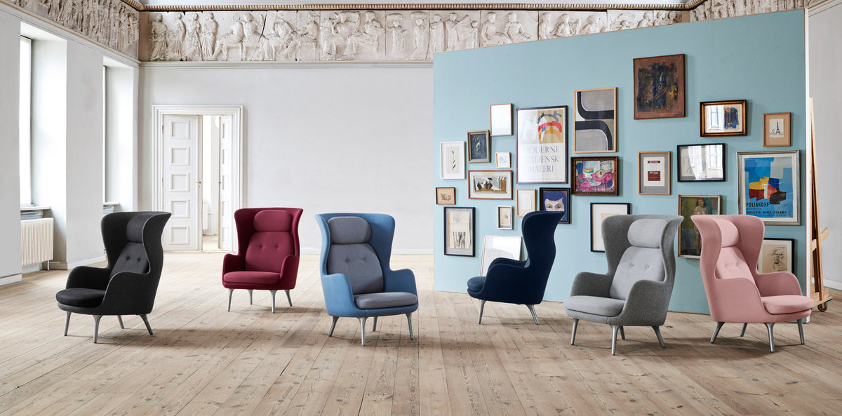 Ro Lounge Chair by Fritz Hansen, showing ro lounge chairs in live shot.