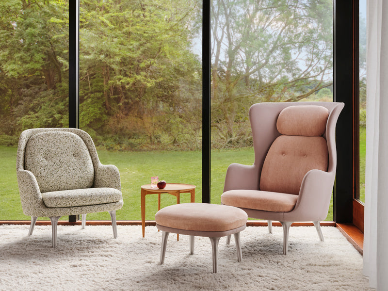 Ro Lounge Chair by Fritz Hansen, showing ro lounge chair in live shot.