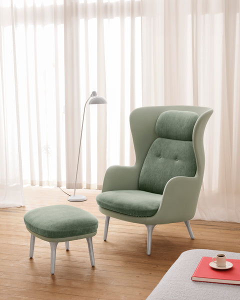 Ro Lounge Chair by Fritz Hansen, showing ro lounge chair in live shot.