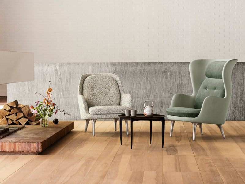 Ro Lounge Chair by Fritz Hansen, showing ro lounge chair in live shot.