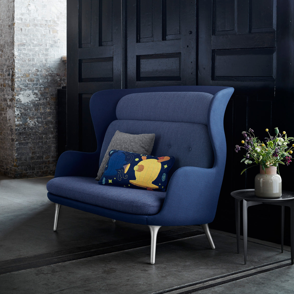 Ro Sofa by Fritz Hansen, showing ro sofa in live shot.