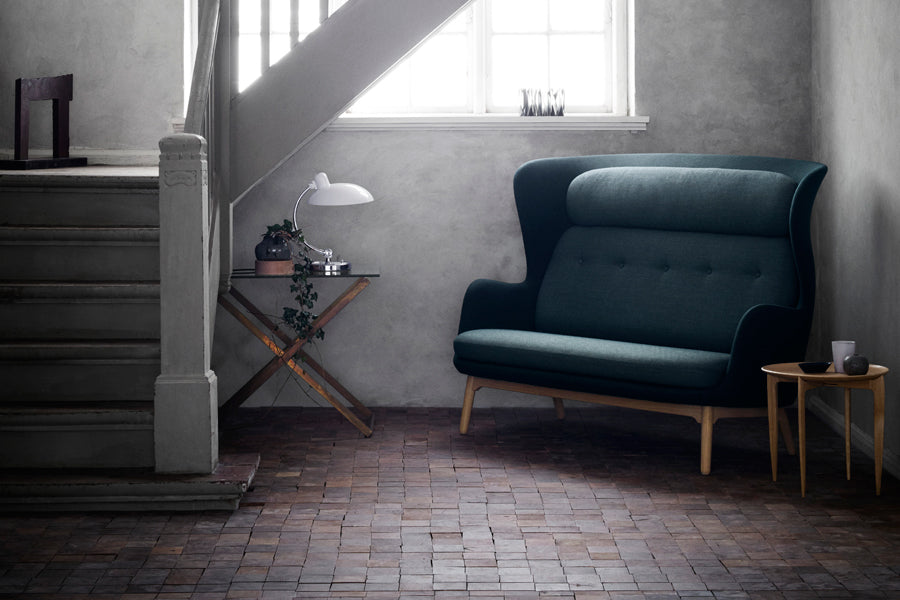Ro Sofa by Fritz Hansen, showing ro sofa in live shot.
