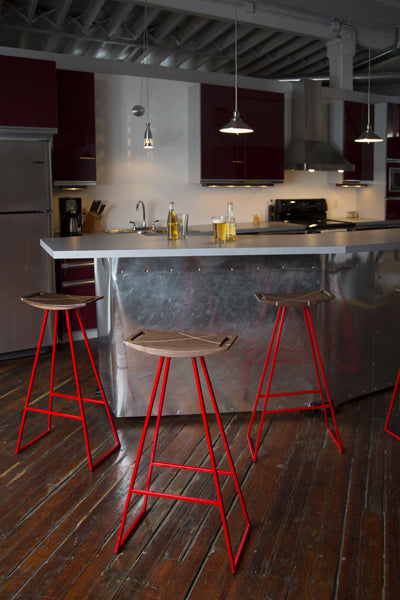 Roberts Bar Stool by Tronk Design, showing roberts bar stools in live shot.