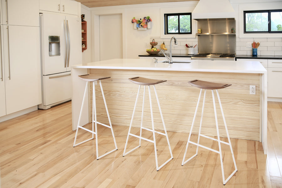 Roberts Bar Stool by Tronk Design, showing roberts bar stools in live shot.