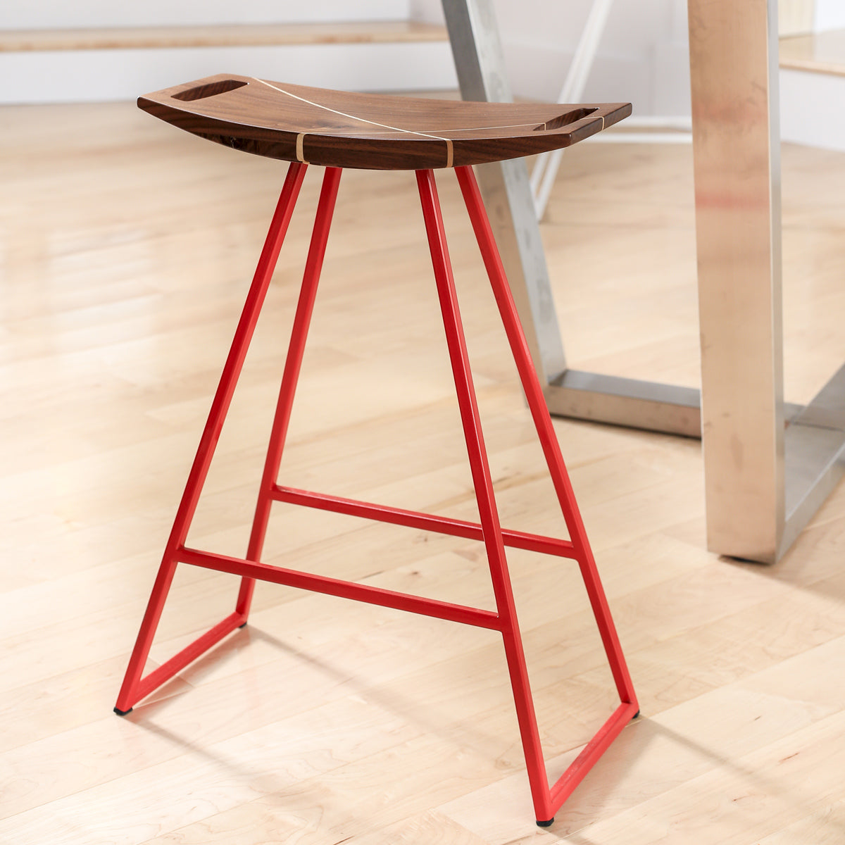 Roberts Counter Stool by Tronk Design, showing roberts counter stools in live shot.