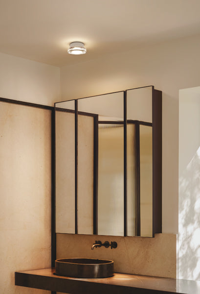 Roc Mini IP65 Wall/Ceiling Light by Marset, showing roc mini ip65 wall/ceiling light in live shot.