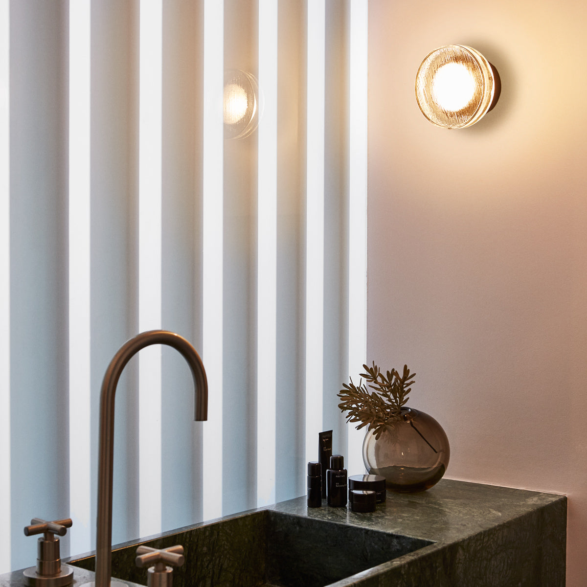 Roc Mini IP65 Wall/Ceiling Light by Marset, showing roc mini ip65 wall/ceiling light in live shot.