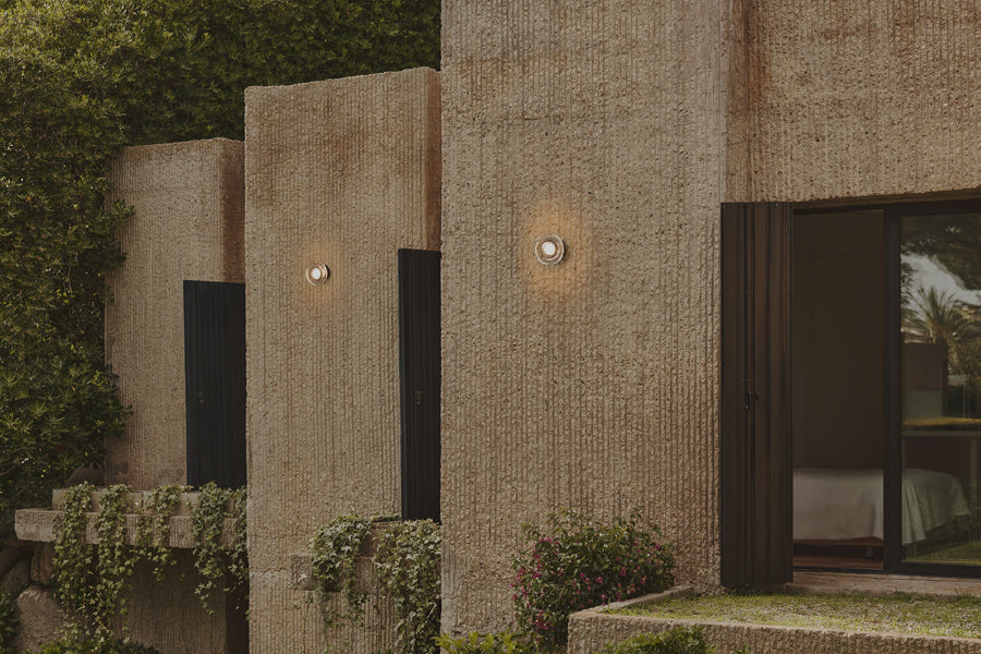 Roc Mini IP65 Wall/Ceiling Light by Marset, showing roc mini ip65 wall/ceiling lights in live shot.
