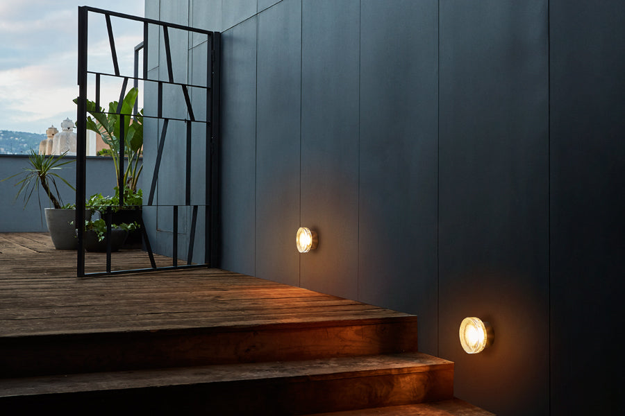 Roc Mini IP65 Wall/Ceiling Light by Marset, showing roc mini ip65 wall/ceiling lights in live shot.