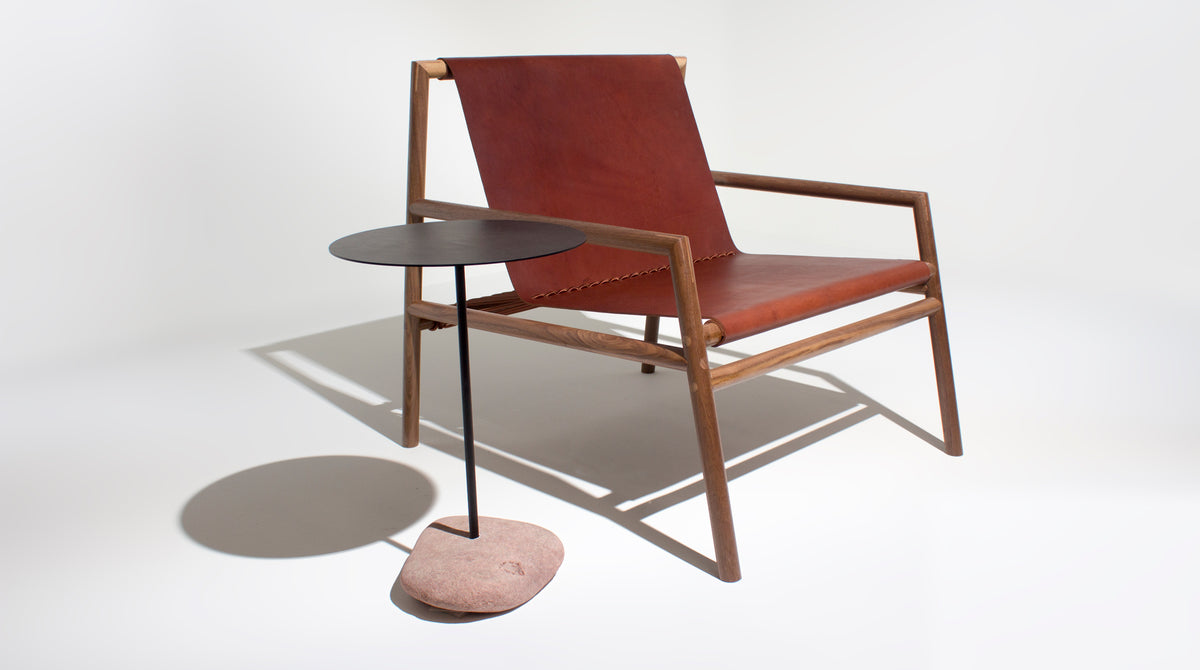 Rocky Tabloa Side Table by Tronk Design, showing rocky tabloa side table in live shot.
