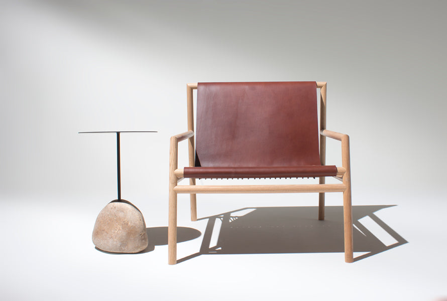 Rocky Tabloa Side Table by Tronk Design, showing rocky tabloa side table in live shot.