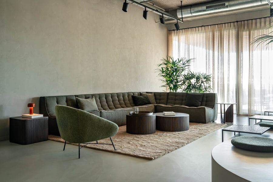 Roller Max Coffee Table by Ethnicraft, showing roller max coffee tables in live shot.