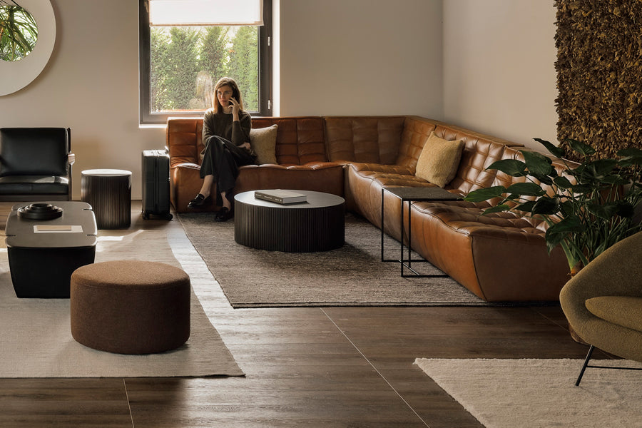 Roller Max Coffee Table by Ethnicraft, showing roller max coffee table in live shot.