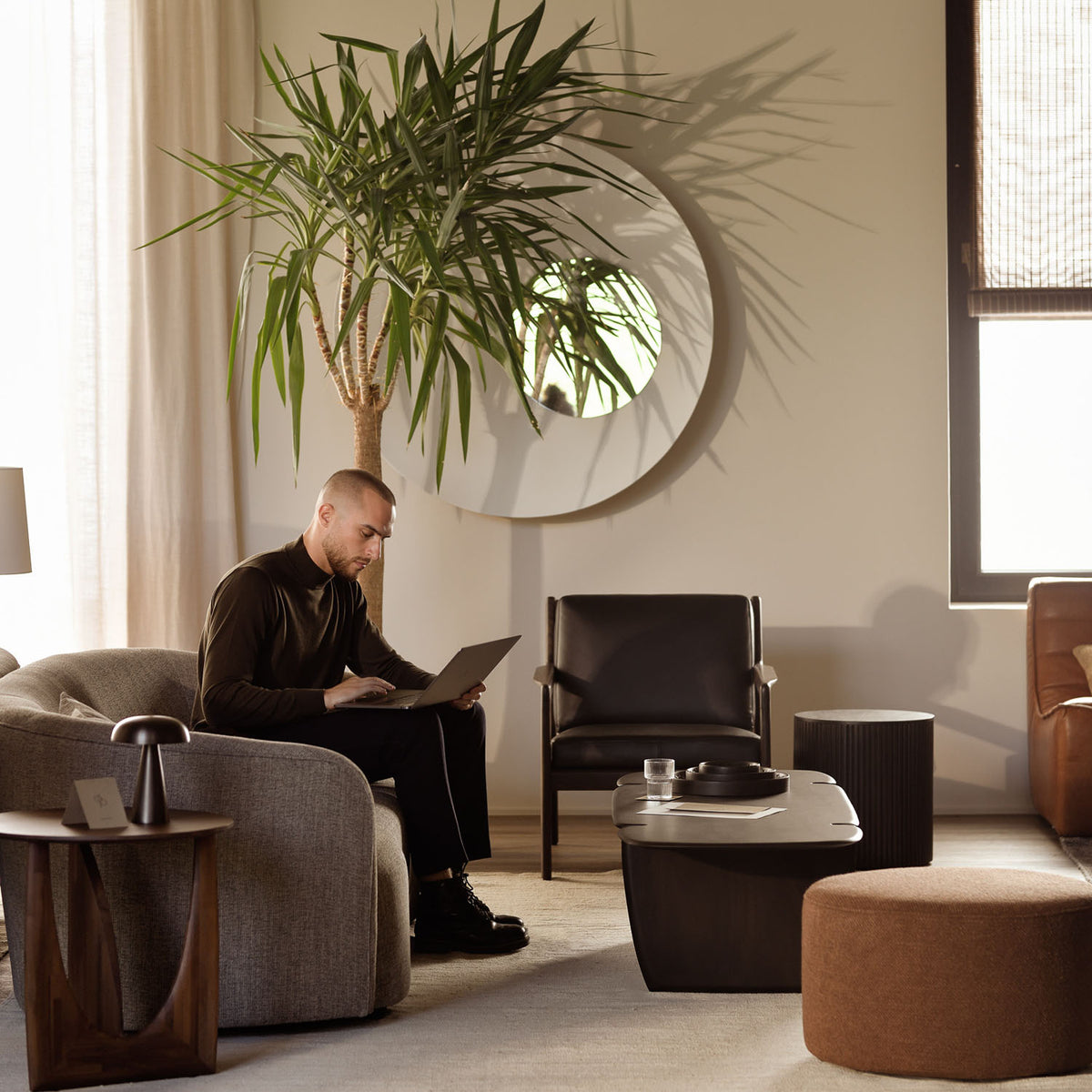Roller Max Pouf by Ethnicraft, showing roller pouf in live shot.