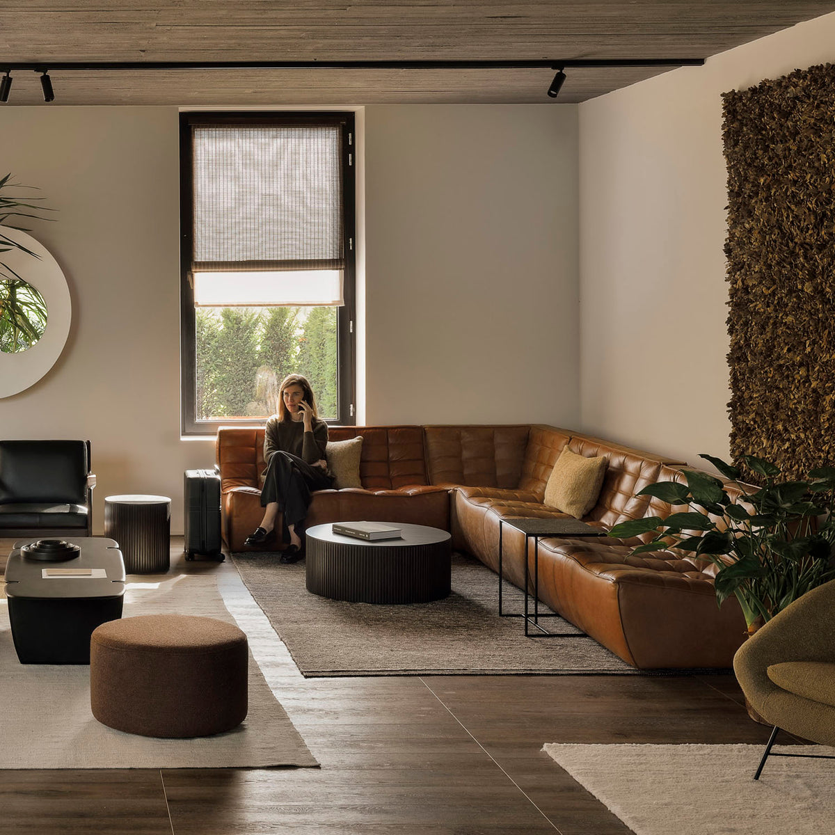 Roller Max Pouf by Ethnicraft, showing roller pouf in live shot.
