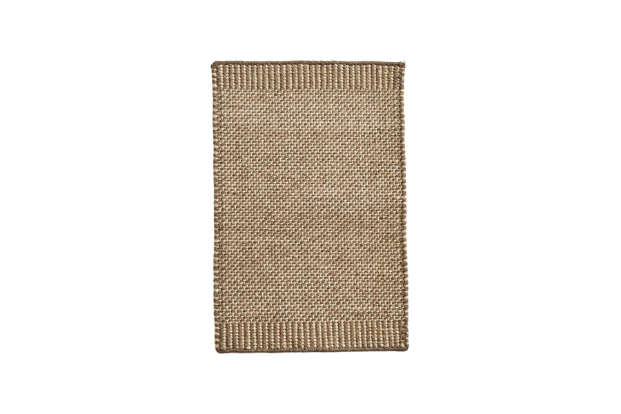 Rombo Mat by Woud, showing front view of rombo mat in small/brown woven wool.