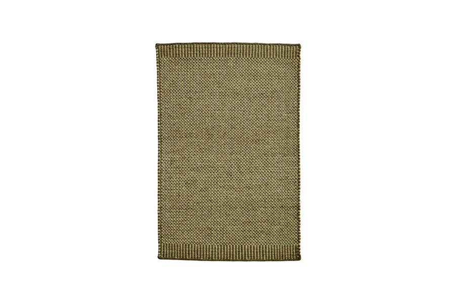 Rombo Mat by Woud, showing front view of rombo mat in large/moss green woven wool.