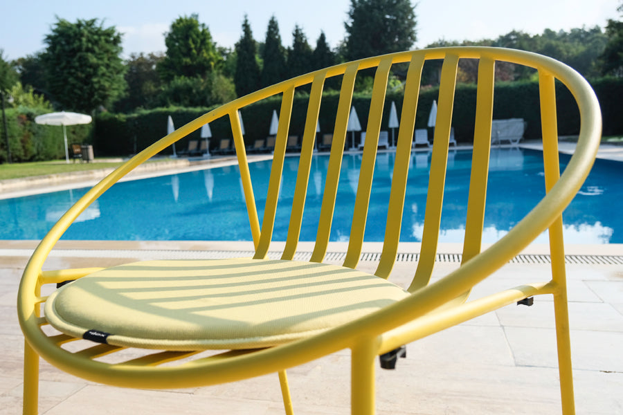 Rosa Lounge Chair by Kollektiff, showing closeup view of rosa lounge chair in live shot.