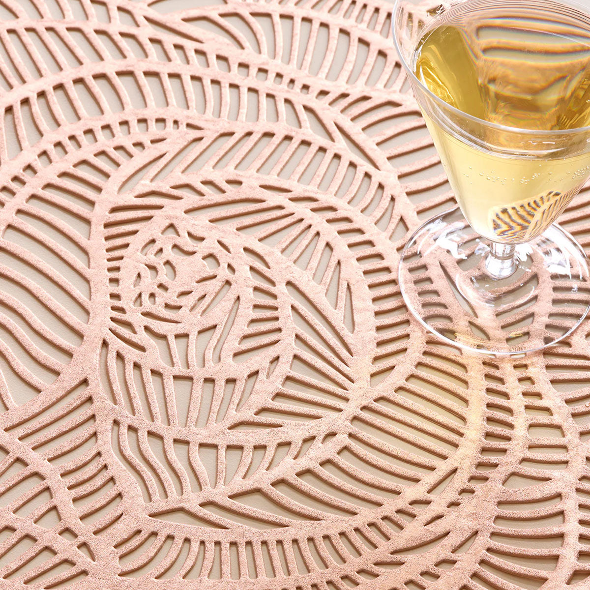 Rose Placemat by Chilewich, showing closeup view of rose placemat in live shot.