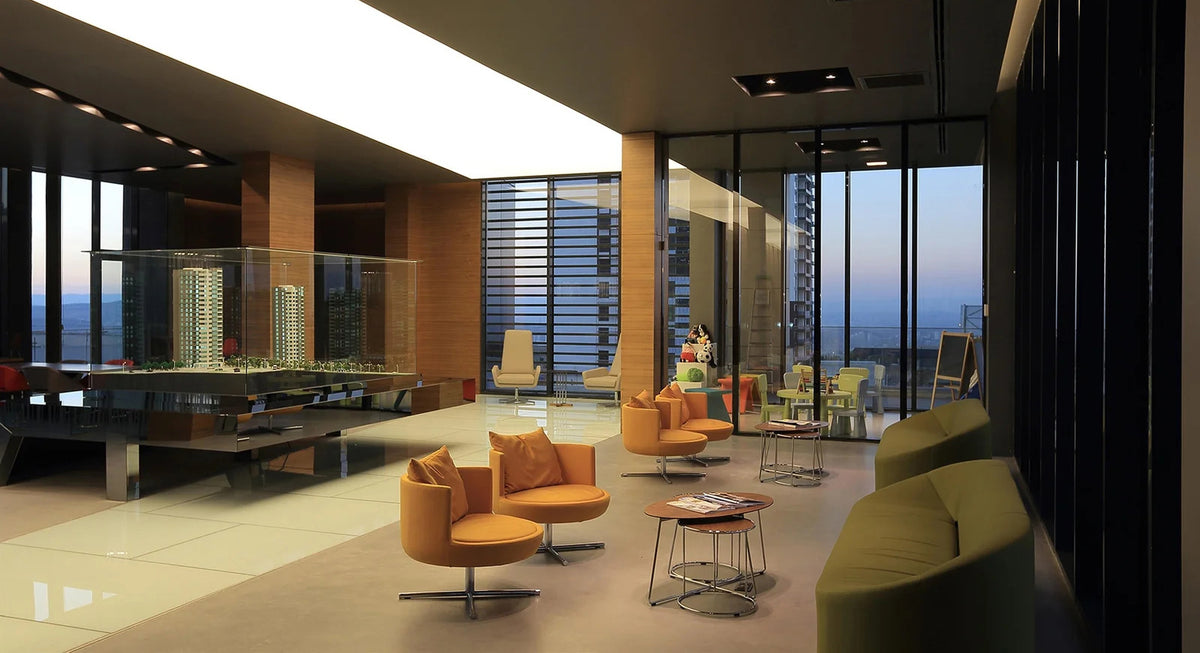 Round Swivel Metal Lounge Chair by B&T, showing round swivel metal lounge chairs in live shot.