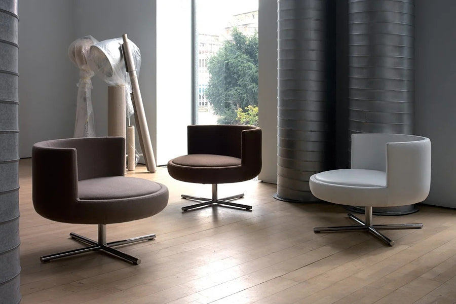 Round Swivel Metal Lounge Chair by B&T, showing round swivel metal lounge chairs in live shot.