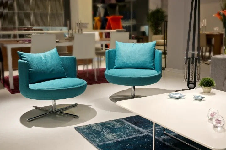 Round Swivel Metal Lounge Chair by B&T, showing round swivel metal lounge chairs in live shot.