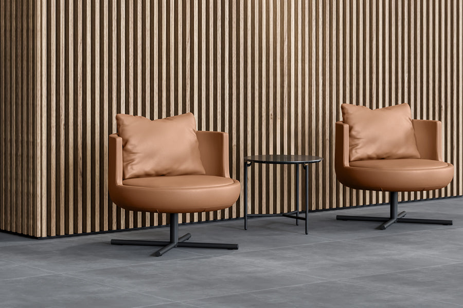 Round Swivel Metal Lounge Chair by B&T, showing round swivel metal lounge chairs in live shot.