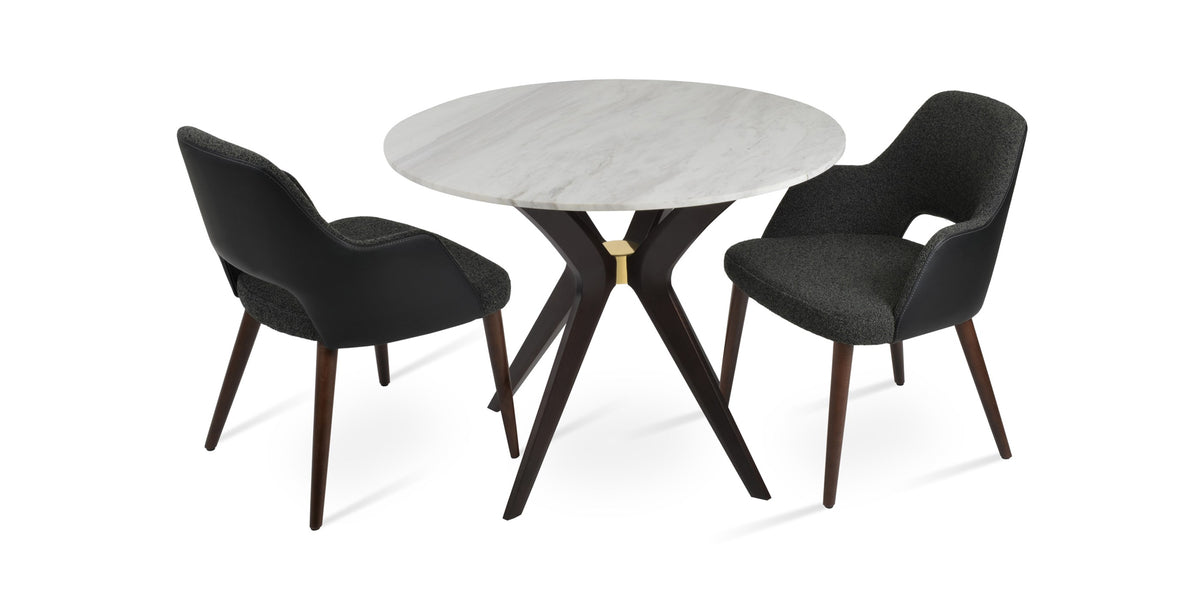 Sabrina Dining Chair by SohoConcept, showing different angle view of sabrina dining chairs armrests/black boucle fabric/black ppm-fr with table.