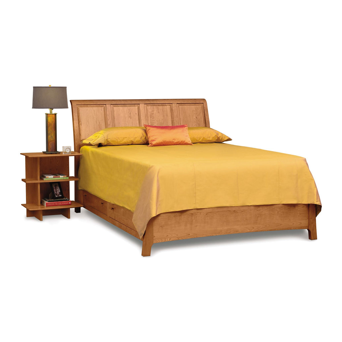 Sarah Nightstand by Copeland Furniture, showing angle view of sarah nightstand in left/natural cherry with bed.