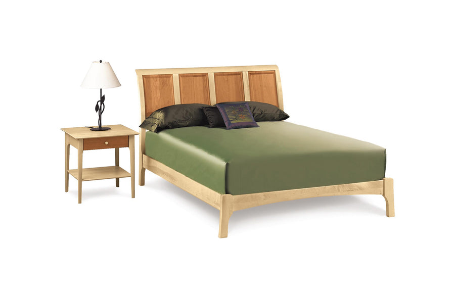Sarah Nightstand by Copeland Furniture, showing angle view of sarah nightstand in 24" high 1 drawer cherry/maple with bed.