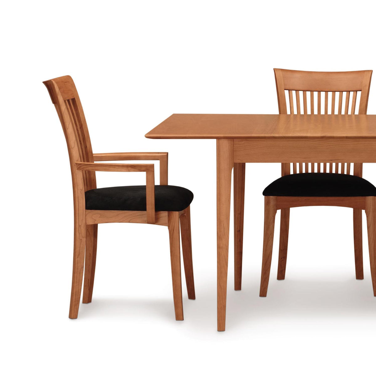 Sarah Upholstered ArmChair by Copeland Furniture, showing sarah upholstered armchair with table.