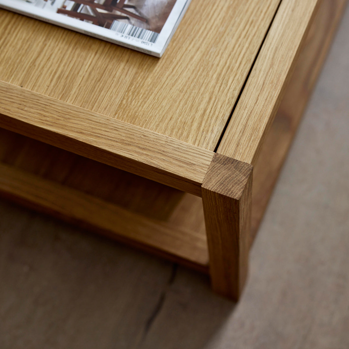Scale Coffee Table by Cane-Line, showing closeup view of scale coffee table in live shot.