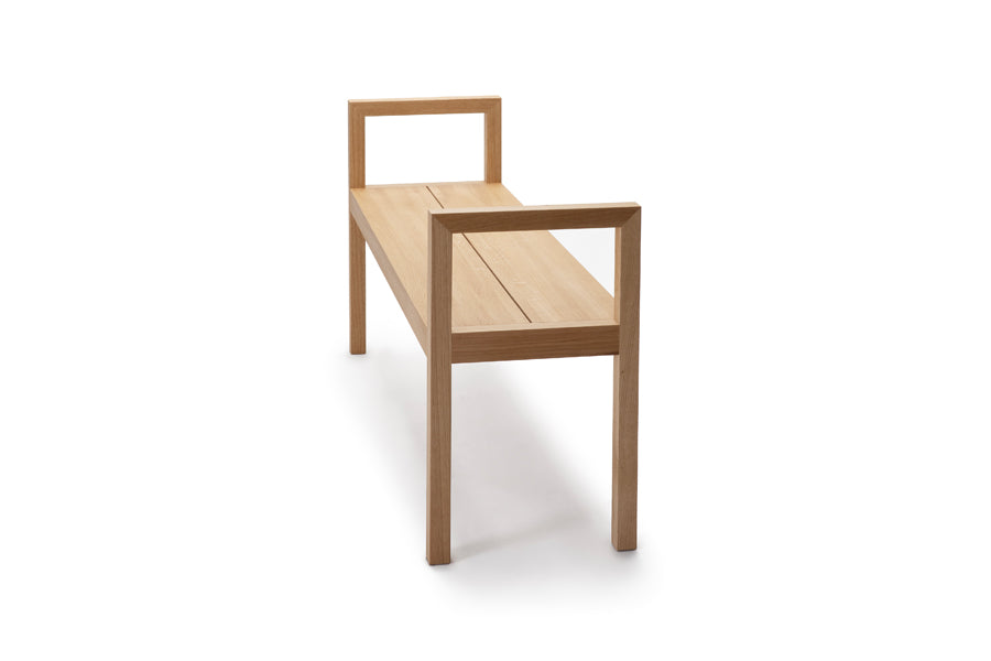 Seminar Bench by Nikari, showing side view of seminar bench in 26.77" high, oak.