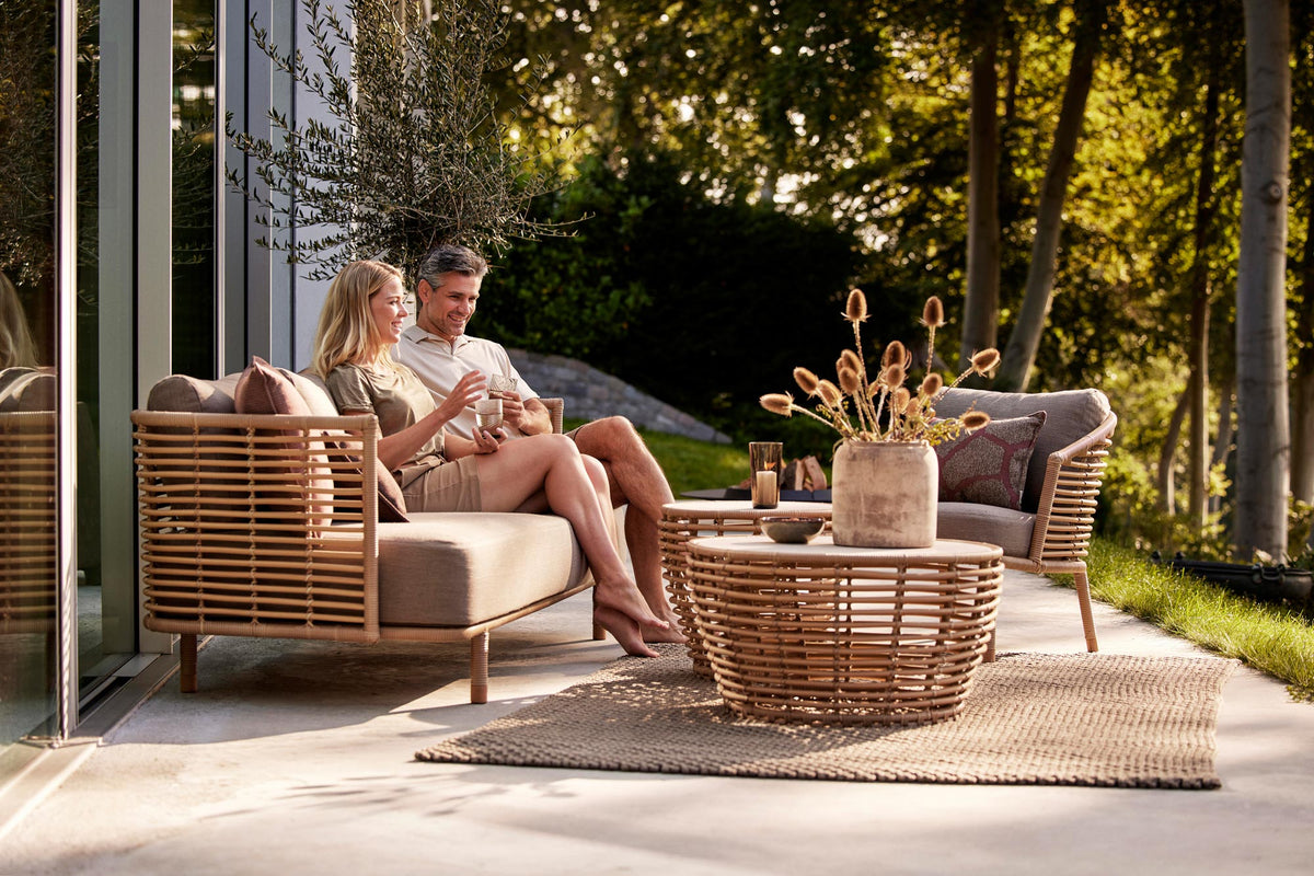 Sense Outdoor Lounge Chair by Cane-Line, showing sense outdoor lounge chair in live shot.