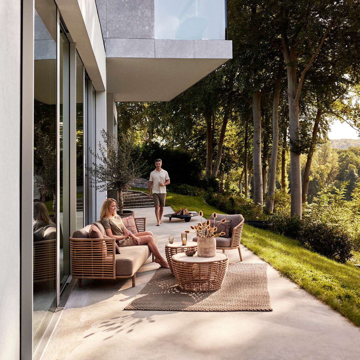 Sense Outdoor Lounge Chair by Cane-Line, showing sense outdoor lounge chair in live shot.