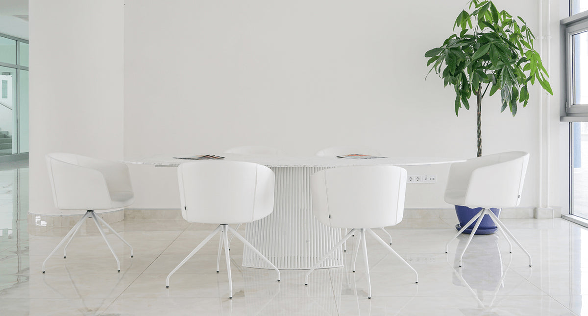 Seri Pedestal Table by B&T, showing seri pedestal table in live shot.