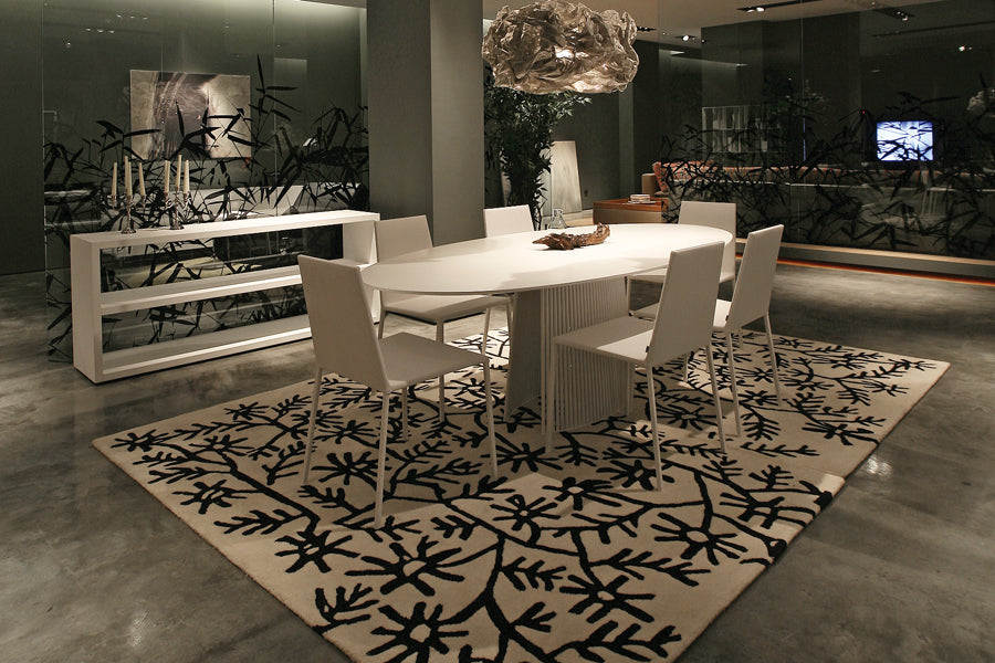 Seri Pedestal Table by B&T, showing seri pedestal table in live shot.