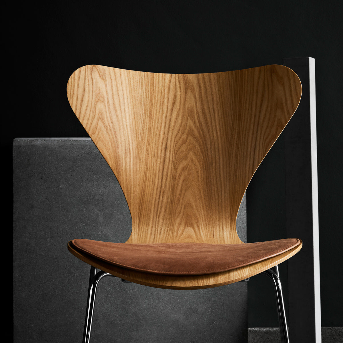 Series 7 Chair by Fritz Hansen, showing closeup view of series 7 chair in live shot.