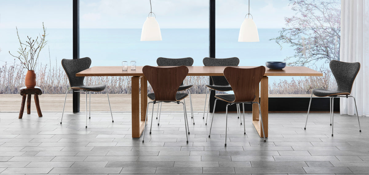 Series 7 Front Upholstery Steel Chair by Fritz Hansen, showing series 7 front upholstery steel chairs in live shot.