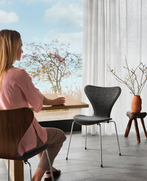 Series 7 Front Upholstery Steel Chair by Fritz Hansen, showing series 7 front upholstery steel chairs in live shot.