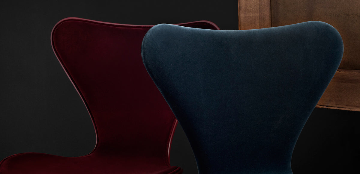 Series 7 Front Upholstery Swivel Chair by Fritz Hansen, showing closeup view of series 7 front upholstery swivel chair in live shot.