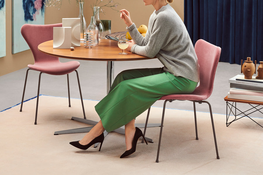 Series 7 Full Upholstery Chair by Fritz Hansen, showing series 7 full upholstery chairs in live shot.
