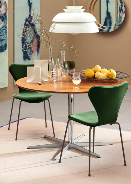 Series 7 Full Upholstery Chair by Fritz Hansen, showing series 7 full upholstery chairs in live shot.