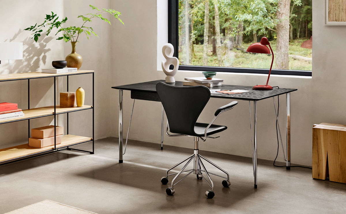 Series 7 Full Upholstery Swivel Armchair by Fritz Hansen, showing series 7 full upholstery swivel armchair in live shot.