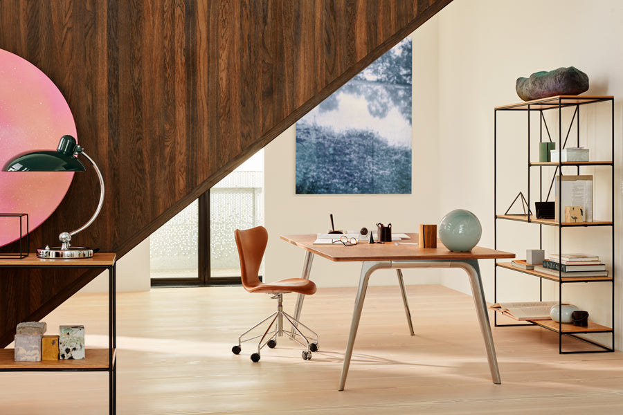 Series 7 Full Upholstery Swivel Chair by Fritz Hansen, showing series 7 full upholstery swivel chair in live shot.